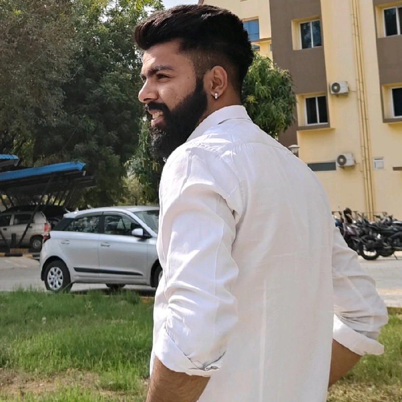 Professional headshot of Karan